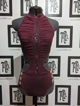 Leotard with cutouts, roushing, skirt & embellishments