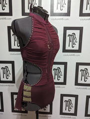 Leotard with cutouts, roushing, skirt & embellishments