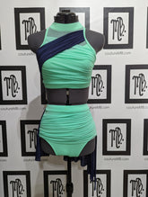 2 two piece with skirt & overlays