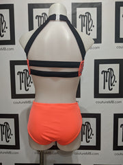 Neon leotard with cutouts and embellishments