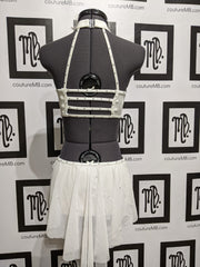 Leotard with hip cutouts, roushing, skirt & embellishments