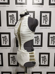 Leotard with hip cutouts, roushing, skirt & embellishments