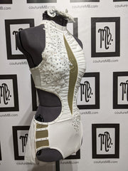 Leotard with hip cutouts, roushing, skirt & embellishments
