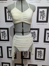 2 two piece with roushing mesh overlay and skirt