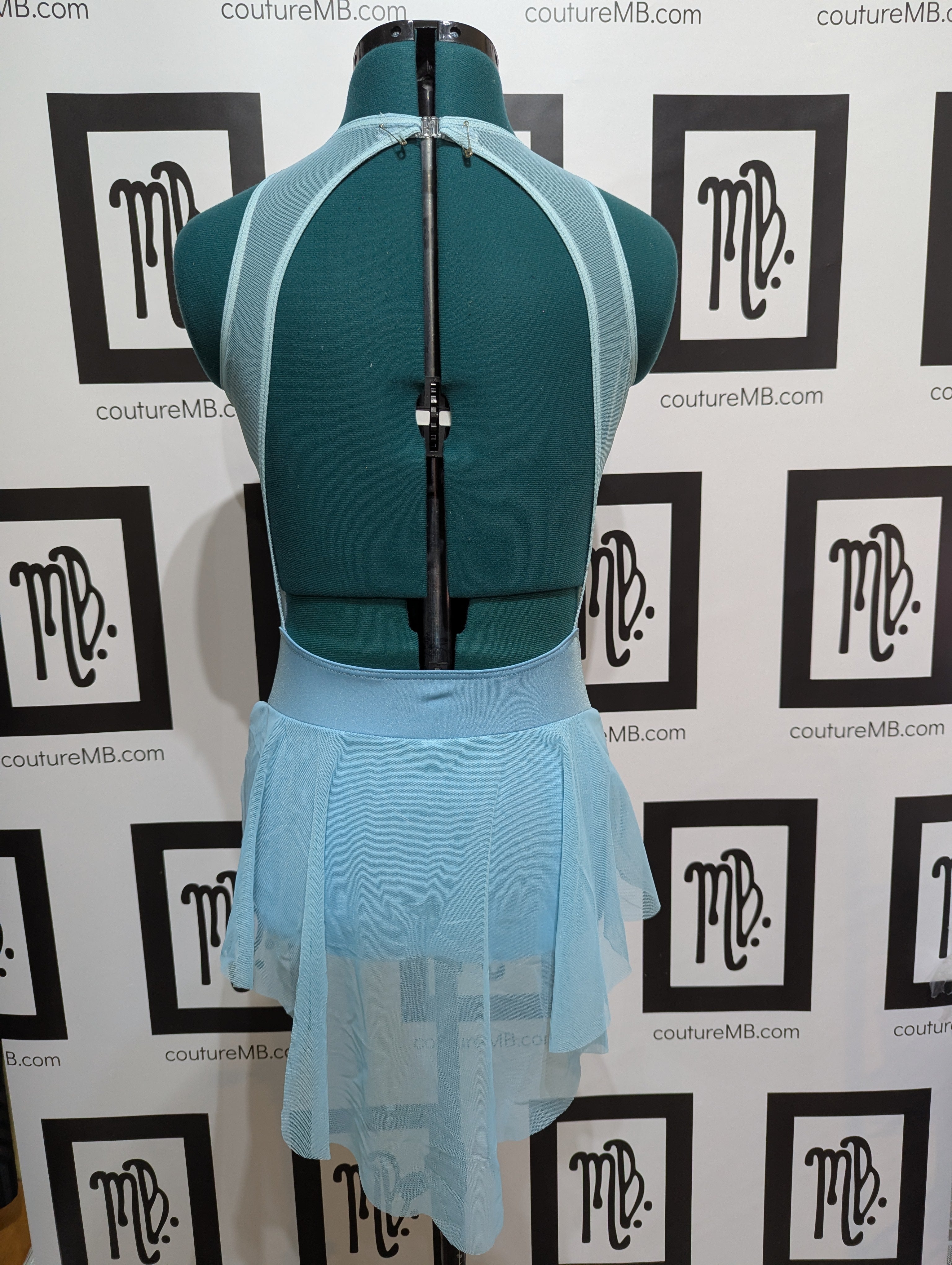 Geometric leotard with open back and skirt