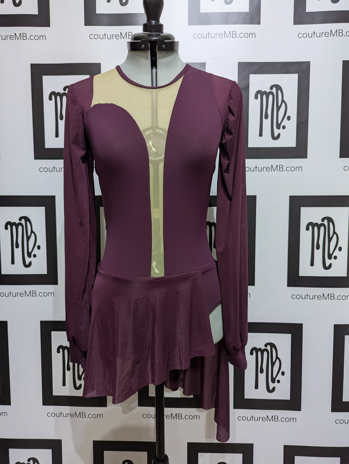 Asymmetrical deep dive with sleeves & skirt